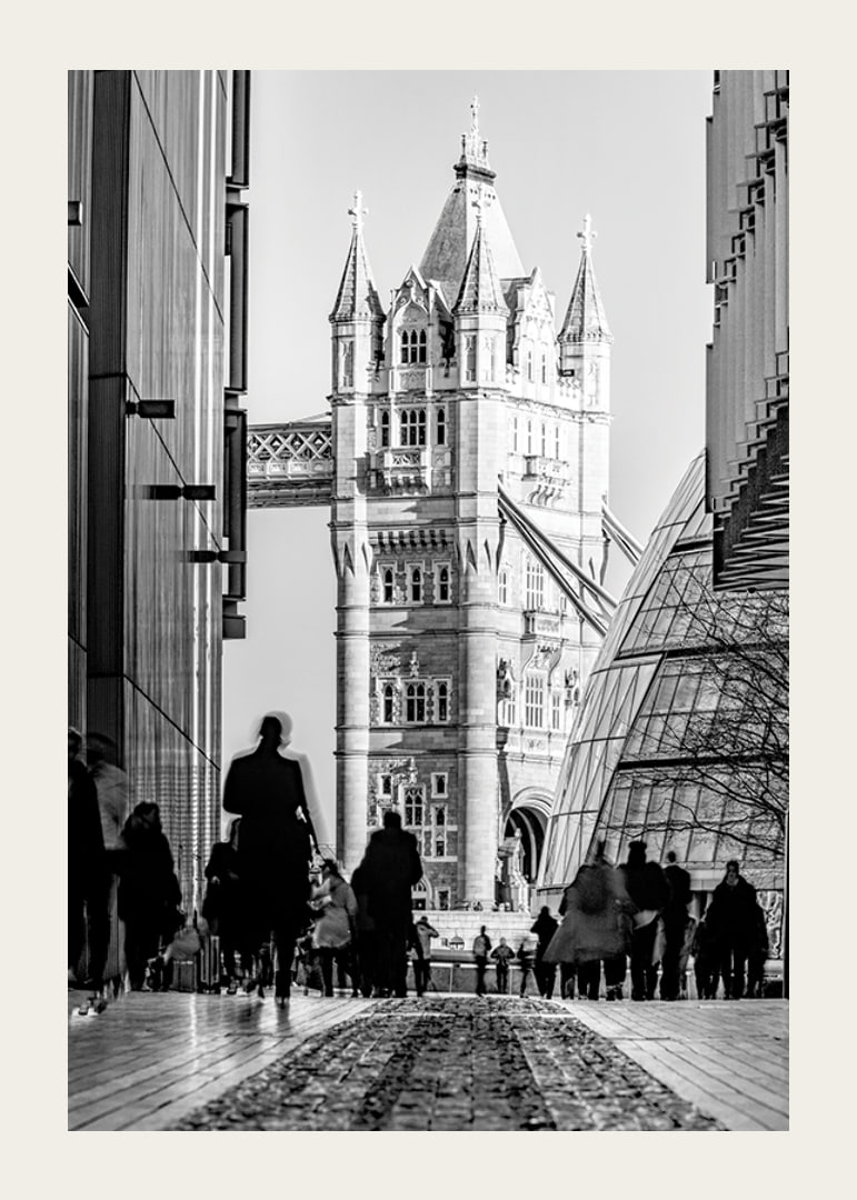 Black and white photograph of Tower Bridge with silhouettes of people-12
