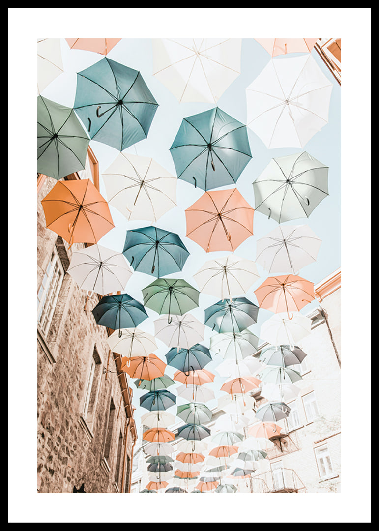 Photograph of colorful umbrellas floating over a city street-12