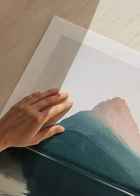 Photograph of water ripples on lake with mountains in the background-9