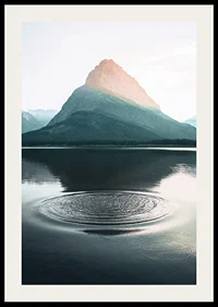 Photograph of water ripples on lake with mountains in the background-2