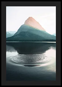 Photograph of water ripples on lake with mountains in the background-4
