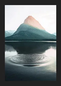 Photograph of water ripples on lake with mountains in the background-5