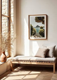 Photograph of lake landscape with treetops and mountains in the background-8