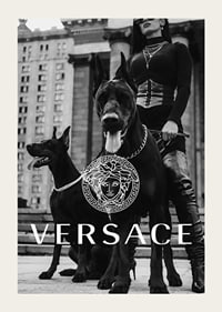 Black and white fashion photo of woman with two Doberman dogs-3