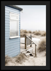 Photograph of light blue beach house by sand dunes and dry grass-4
