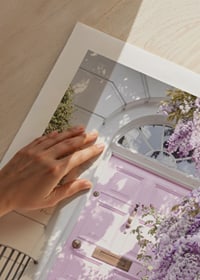 Light purple entrance door surrounded by purple flowers and greenery-9