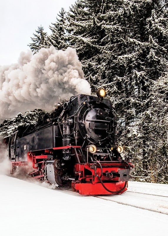 Steam locomotive trudging through snowy winter landscape, photography-12