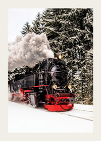 Steam locomotive trudging through snowy winter landscape, photography-3