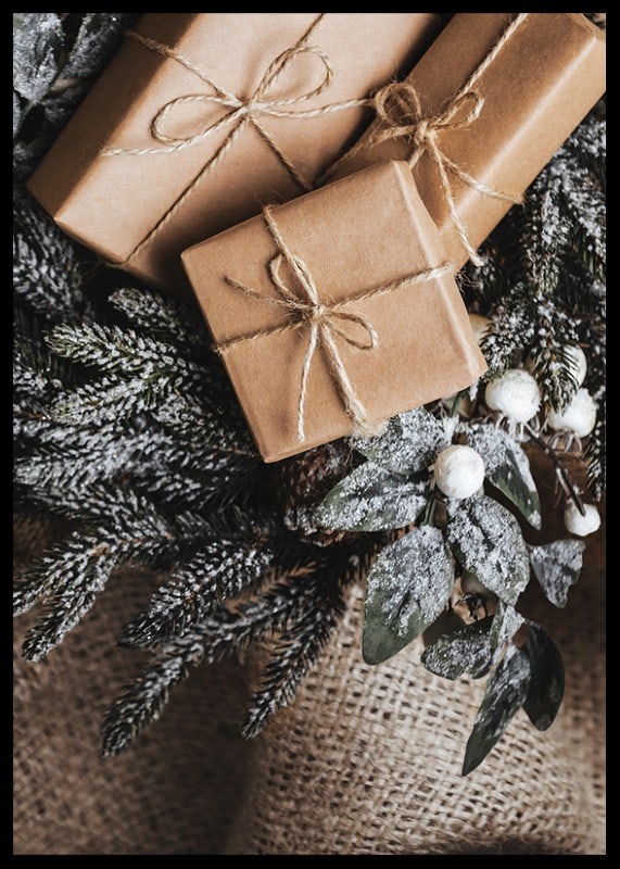 Brown Christmas presents with string on fir tree and jute fabric, close-up-12