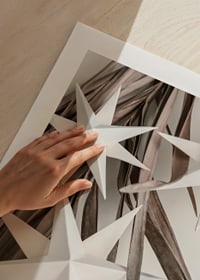 White paper stars against dried beige leaves, minimalist style-9