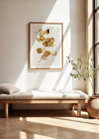 Minimalist eucalyptus branch with golden leaves against white background-8