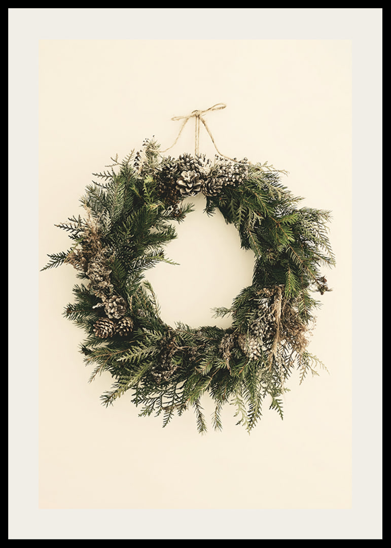 Photograph of green Christmas wreath with pine cones on beige background-12