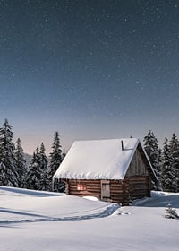 Snow-covered log cabin under starry night sky in winter landscape-7