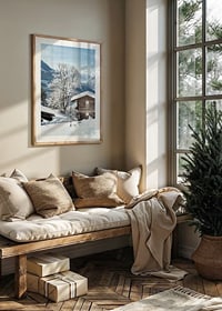 Photograph of wooden cabin in snow-covered mountain landscape and blue sky-8