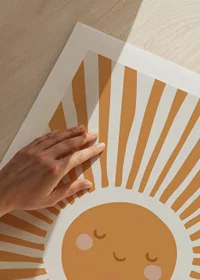 Illustrated sun with smiling face and rays in orange-9