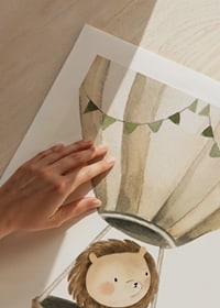 Watercolor illustration of lion in hot air balloon with pennants-9