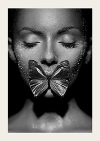 Black and white close-up portrait of woman with butterfly over mouth-5