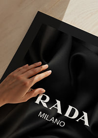 Black and white text with Prada Milano over pleated satin-9