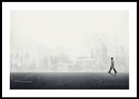 Illustrated man walking on empty street with city silhouette in grayscale-0