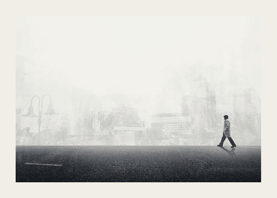 Illustrated man walking on empty street with city silhouette in grayscale-12