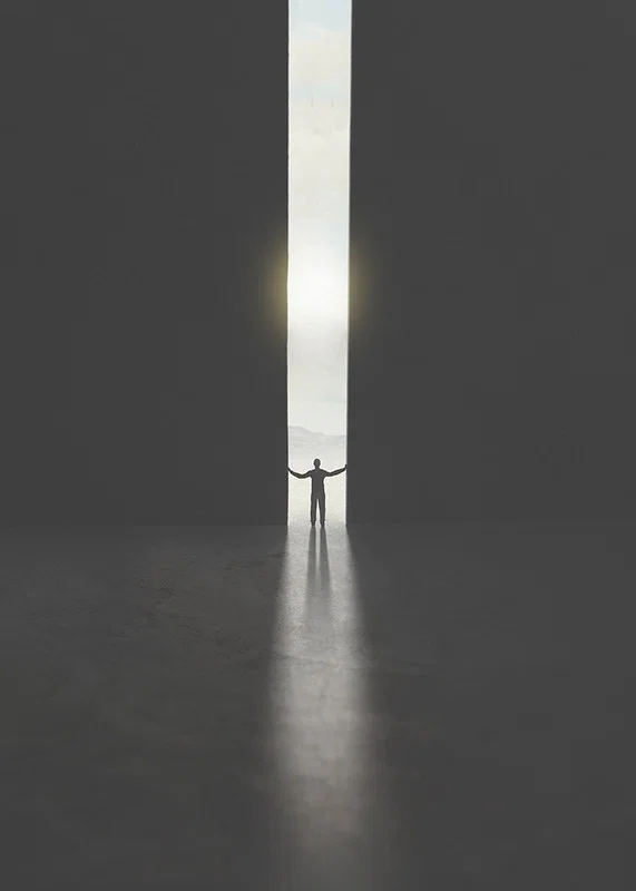 Silhouette of man opening dark doors to the light-12