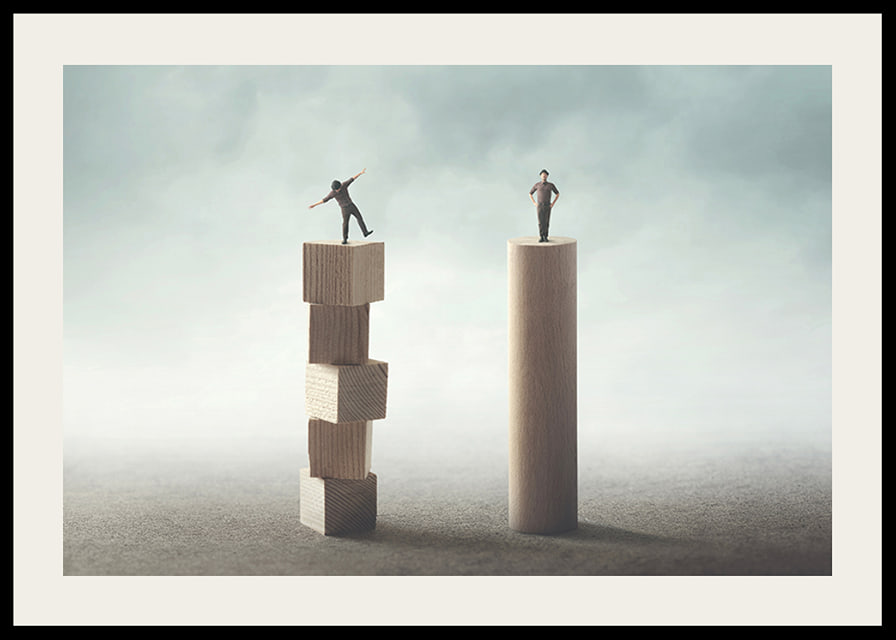 Two people balancing on wooden pillars against gray background-12