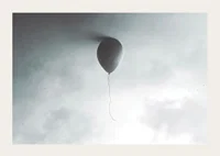 Surreal balloon against light gray sky with clouds-3