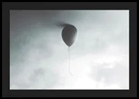 Surreal balloon against light gray sky with clouds-4