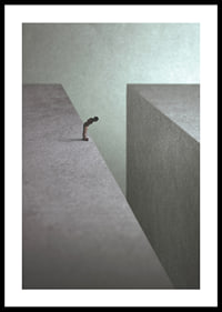Illustrated man at the edge of wide gorge in gray tones-0
