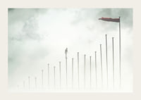 Surreal illustration of man on tall pillars in fog-3