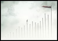 Surreal illustration of man on tall pillars in fog-6