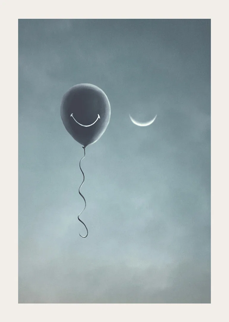Surreal balloon with smile and crescent moon against gray sky-12