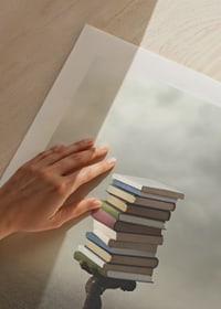Surreal illustration of person carrying pile of books-9