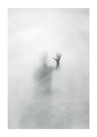 Silhouette of person behind hazy glass in grayscale-1