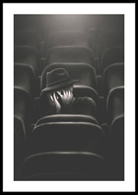 Illustrated man with hat hiding his face in dark cinema hall-2