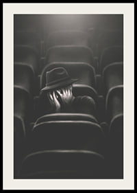 Illustrated man with hat hiding his face in dark cinema hall-4