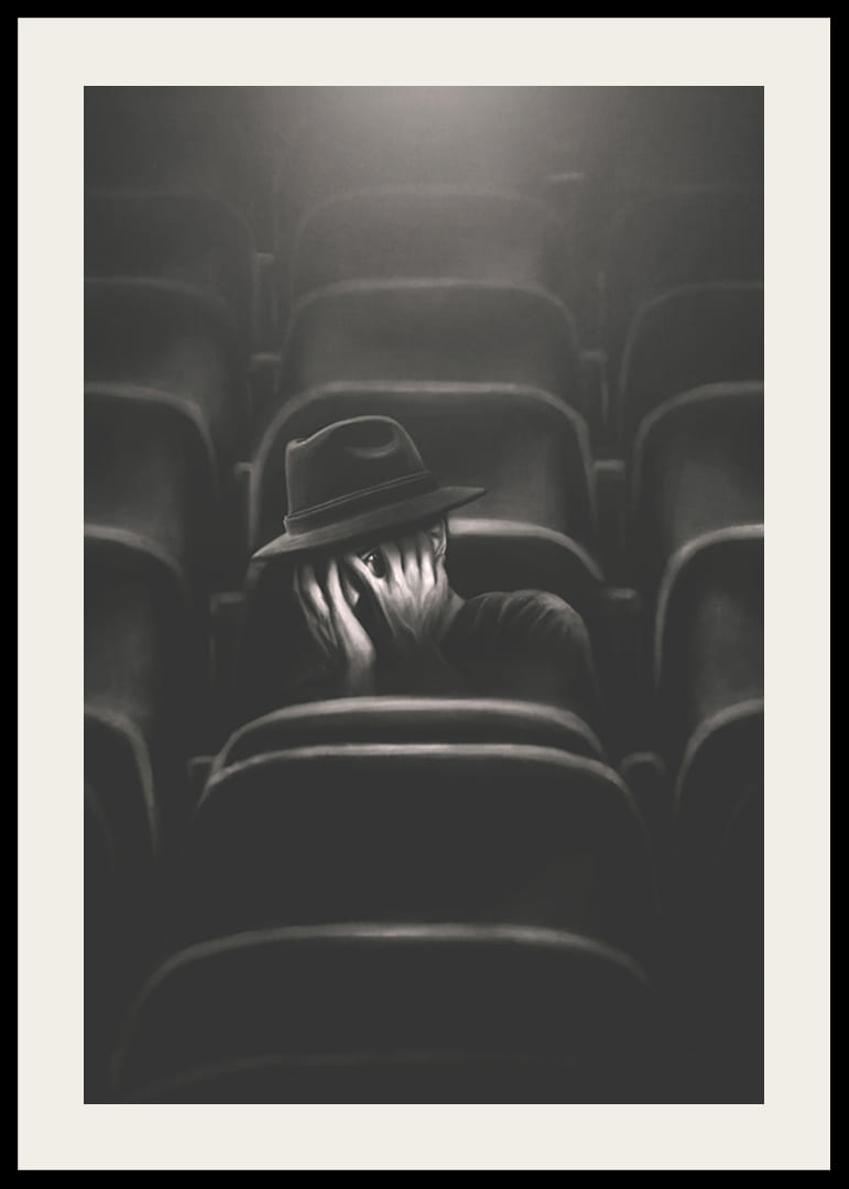 Illustrerad man med hatt gömmer ansiktet i mörk biosalong-12