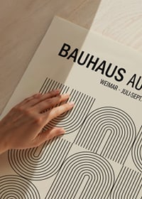 Graphic Bauhaus-inspired poster with black lines and text-3