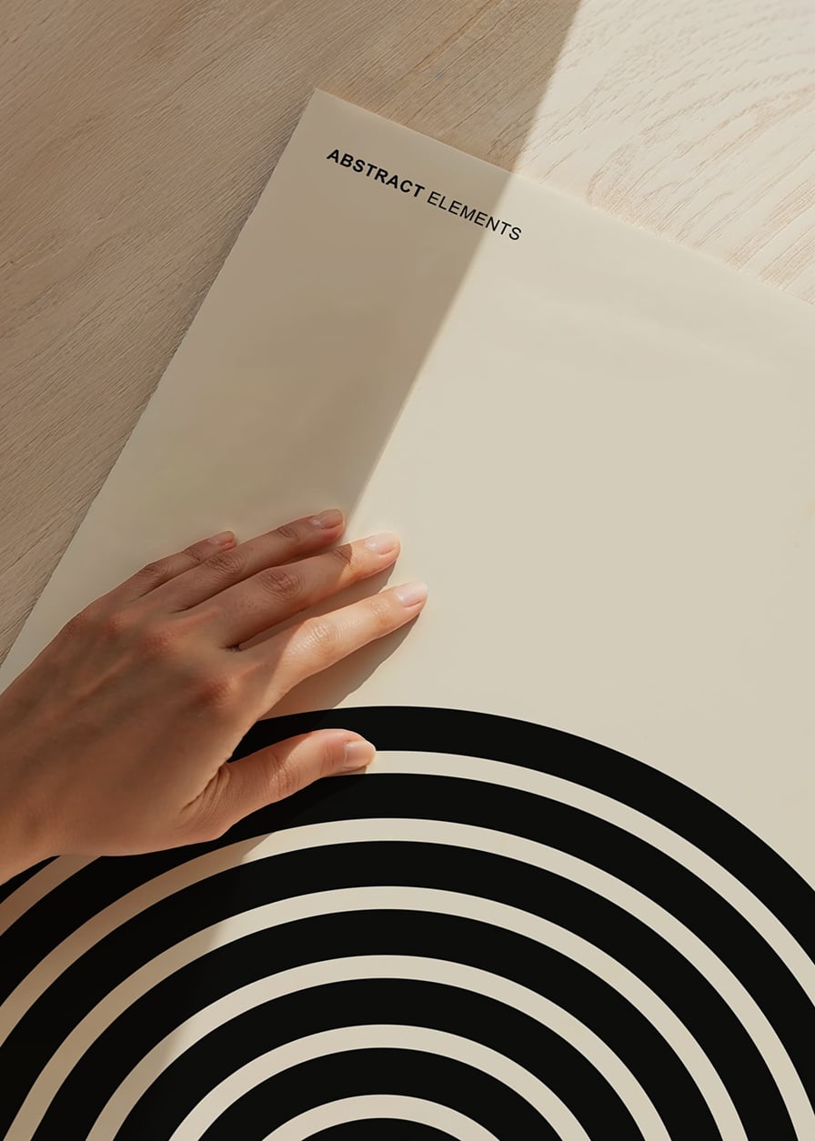 Graphic motif with black circular lines on beige background-12