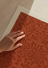 Dense, graphic pattern with acorns and oak leaves in rust red and beige tones against a dark background-3