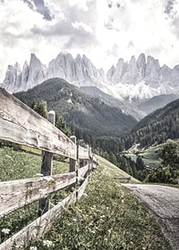 Photographic mountain landscape with wooden fence and dramatic peaks-7