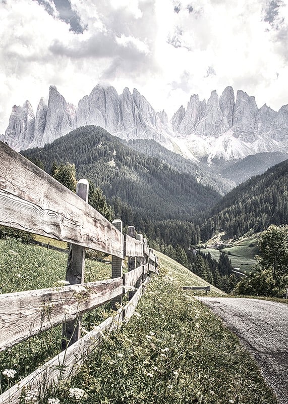 Photographic mountain landscape with wooden fence and dramatic peaks-12