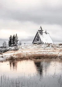 Photographic winter landscape with wooden cabin by a calm lake-7