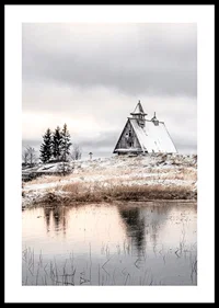 Photographic winter landscape with wooden cabin by a calm lake-0