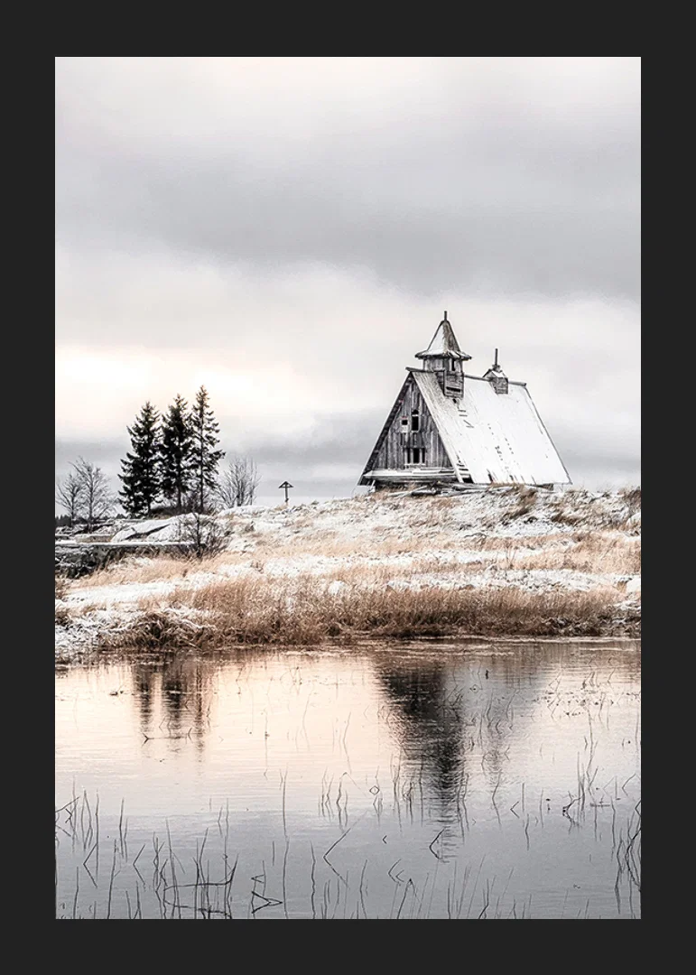 Photographic winter landscape with wooden cabin by a calm lake-12