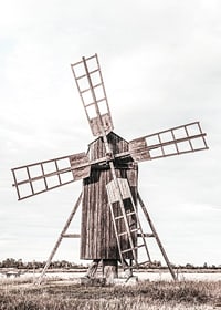 Photograph of old wooden windmill in open field-7