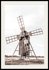 Photograph of old wooden windmill in open field-2