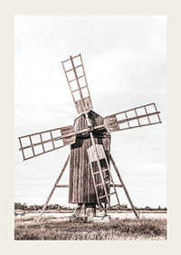 Photograph of old wooden windmill in open field-3