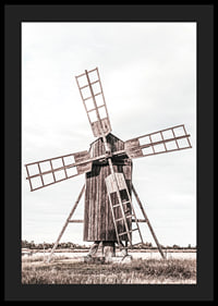 Photograph of old wooden windmill in open field-4