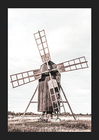 Photograph of old wooden windmill in open field-5